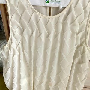 Sleeveless white blouse